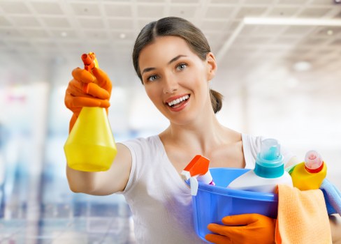 Deep cleaning a fabric armchair in a residential property